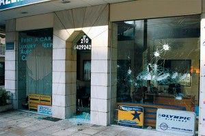 A travel office in downtown Athens damaged during the difficult weeks of December. Such images circulated globally and tarnished the image of the Greek capital. Photo: Christos Mathioudakis