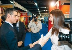 Tourism Development Minister Aris Spiliotopoulos greets Greek Travel Pages Publisher Maria Theofanopoulou at the GTP stand.