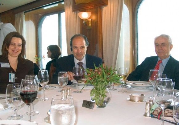 Cruiseplan's executive manager, Demi Galanou, with Travel Plan's assistant to the general manager, Christos Christodoulakis, and the company's general manager, Theodoros Bithas, during a dinner aboard the Queen Mary 2 the company provided to press representatives last month.