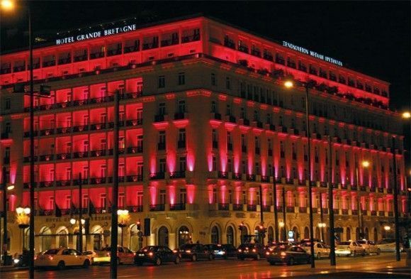 Grande Bretagne Hotel in pink light, as part of the Estee Lauder campaign for breast cancer.