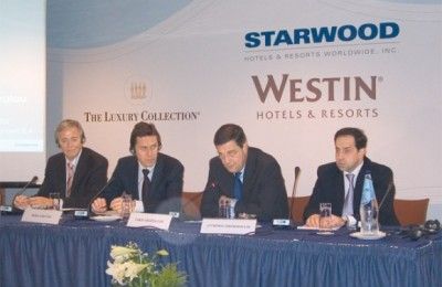 Erhard Noresch and Roeland Vos of Starwood Hotels & Resorts with Takis Arapoglou and Anthimos Thomopoulos of Astir Palace Vouliagmeni S.A.