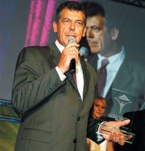 Thanasis Fragidis, sales promotion manager for the Grecotel, accepts the hotel group's latest award.