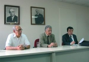 Vassilis Plevris, vice president of the Chamber of Greek Hotels; Professor Panayiotis Pavlopoulos; and Dr. Grigoris Papanikou.