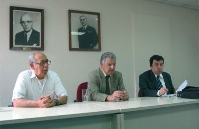 Vassilis Plevris, vice president of the Chamber of Greek Hotels; Professor Panayiotis Pavlopoulos; and Dr. Grigoris Papanikou.