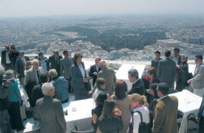 Athens Mayor Dora Bakoyannis (center) gives the foreign press corps an idea of the works underway to upgrade Lycabettus and other areas of the capital.