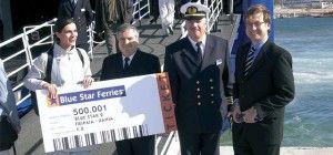 On hand to award the 500,001 passenger on Blue Star's Piraeus-Chania route were company executives, including Attica Enterprises' (Blue Star's major shareholder) chief executive officer, Alexander Panagopoulos (right).
